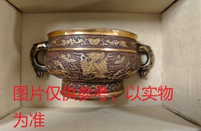 序号27，佚名：胡文明制铜鎏金錾花缠枝花卉纹双兽耳炉，评估价100000元