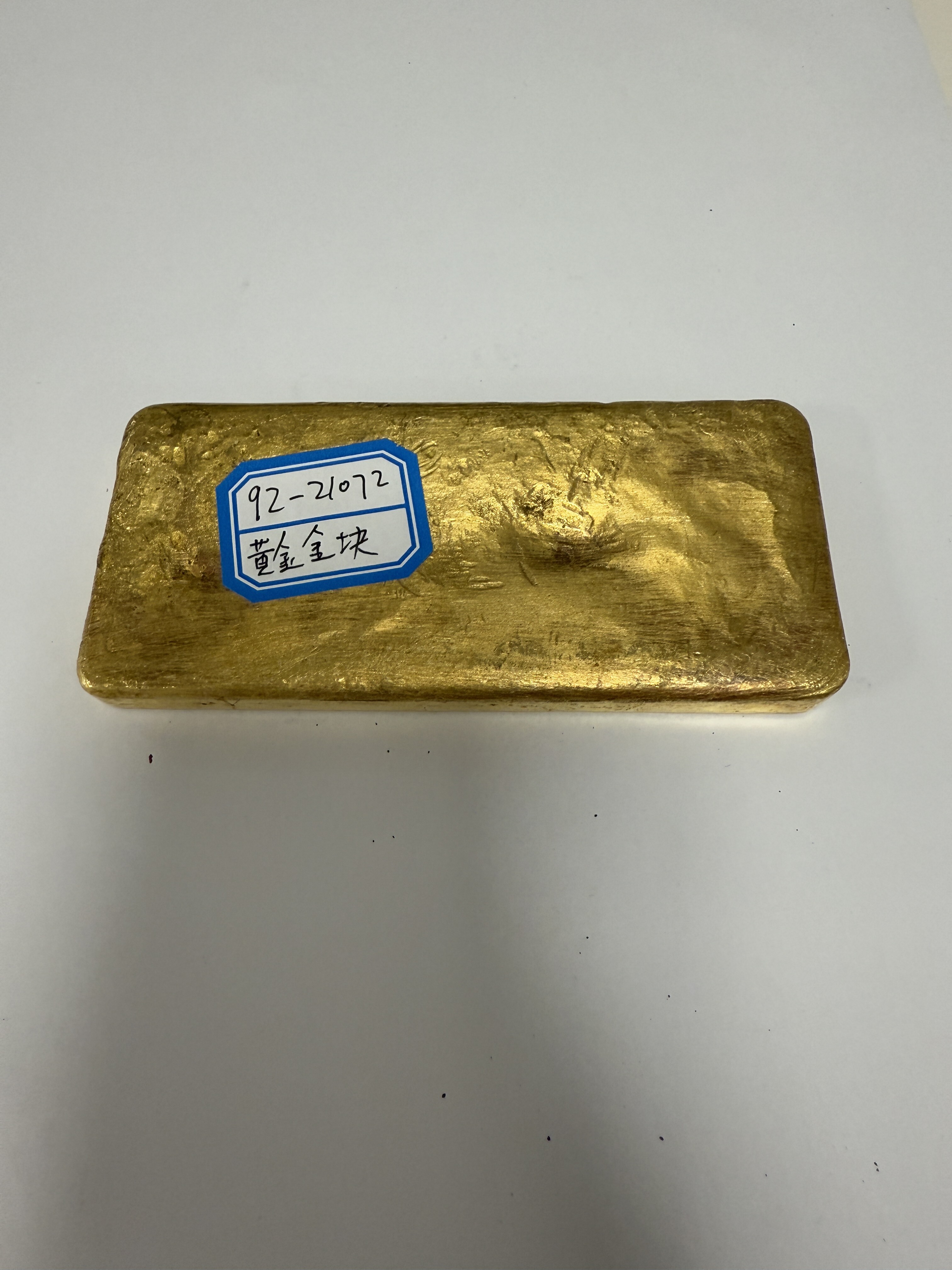序号39：黄金金块980.3‰，1009.55g