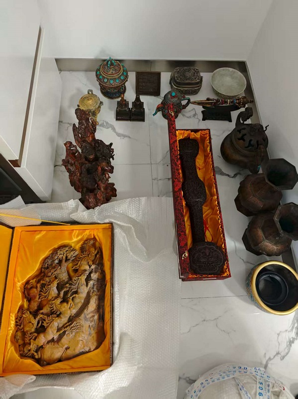 序号33,佛教用具,共16件,评估价13000元